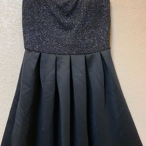 Black dress with sparkles. new with tags